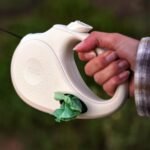 TUG Oval 360° Tangle-Free Retractable Dog Leash with Integrated Waste Bag Dispenser (Small, Cream) - Image 3